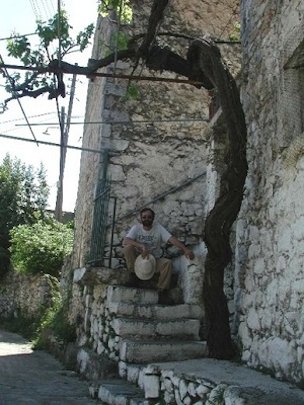 Green Deane with grapevine at his grandfather’s house in Karea, Greece